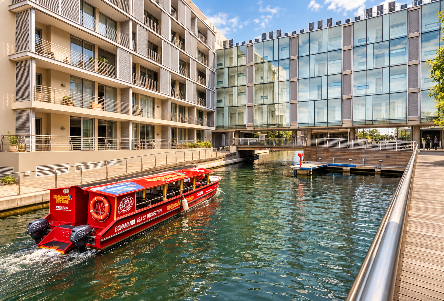 Cape Town canal water taxi arriving at Harbour Bridge